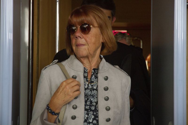 Gisele Pelicot exits the Avignon court house, in Avignon, southern France, Tuesday, Sept. 17, 2024, after her ex-husband admitted in court that for nearly a decade, he repeatedly drugged his unwitting wife and invited dozens of men to rape her while she lay unconscious. (AP Photo/Diane Jantet)