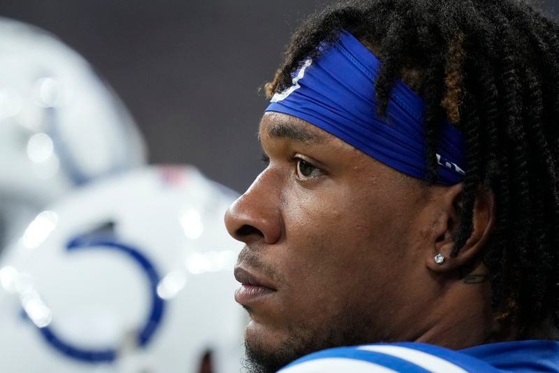 Indianapolis Colts quarterback Anthony Richardson sits on the bench during the second half of an NFL football game against the Pittsburgh Steelers, Sunday, Sept. 29, 2024, in Indianapolis. (AP Photo/Darron Cummings)