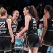 New York Liberty guard Sabrina Ionescu (20) celebrates with forward Breanna Stewart (30) during the second half of a WNBA basketball second-round playoff game against the Las Vegas Aces, Sunday, Sept. 29, 2024, in New York. (AP Photo/Corey Sipkin)