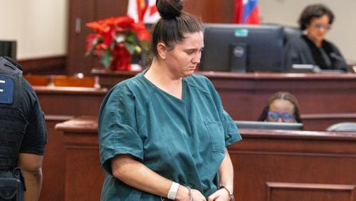 Hannah Payne enters the courtroom for her sentencing Friday. She was found guilty of murder in the shooting death of 62-year-old Kenneth Herring and was sentenced to life in prison with the possibility of parole.