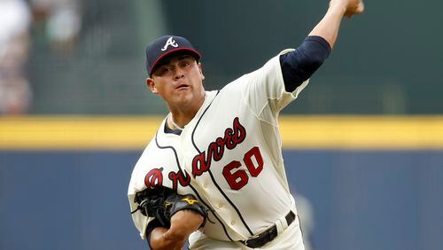 Atlanta Braves starting pitcher Manny Banuelos (60) throws in the first inning of a baseball game against the Chicago Cubs, Saturday, July 18, 2015, in Atlanta. (AP Photo/Brett Davis)