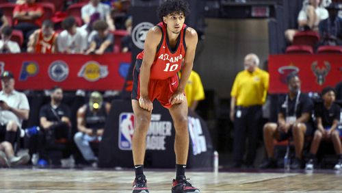 Atlanta Hawks forward Zaccharie Risacher (10) looks on from midcourt during the second half of an NBA summer league basketball game against the Washington Wizards Friday, July 12, 2024, in Las Vegas. (AP Photo/David Becker)