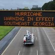 Hurricane warning sign is displayed on I-75 near Adel, Thursday, September 26, 2024. Hurricane Helene is set to make landfall as a major storm in Florida on Thursday evening, bringing rain and damaging wind to Georgia. Emergency officials are warning of fallen trees, downed power lines, shuttered roads and even the possibility of landslides as Helene makes its way through Georgia overnight. (Hyosub Shin / AJC)