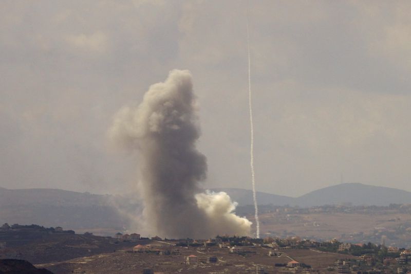 Smoke rises from Israeli airstrikes on Taybeh village, seen from the southern town of Marjayoun, Lebanon, Monday, Sept. 23, 2024. (AP Photo/Hussein Malla)