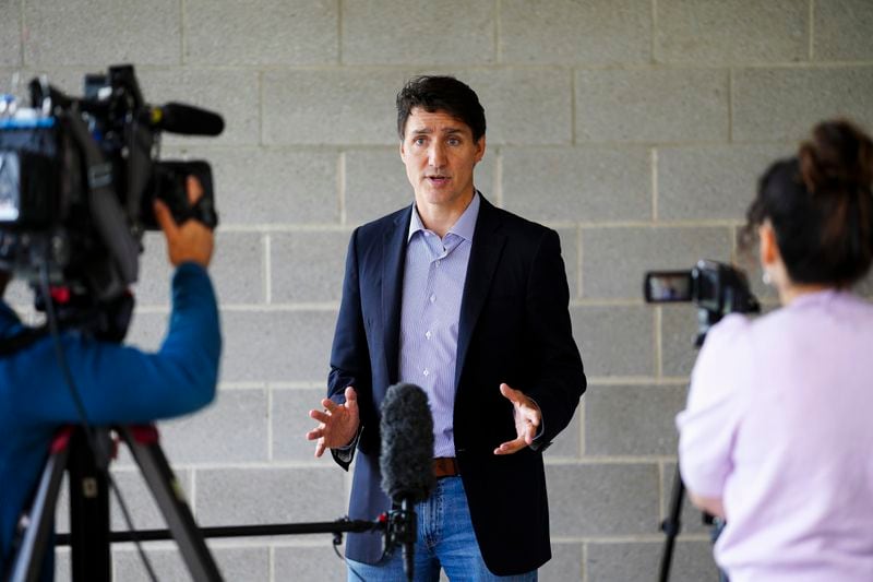 Prime Minister Justin Trudeau delivers a statement on the potential rail strike following an event in Gatineau, Quebec, Wednesday, Aug. 21, 2024. (Sean Kilpatrick/The Canadian Press via AP)