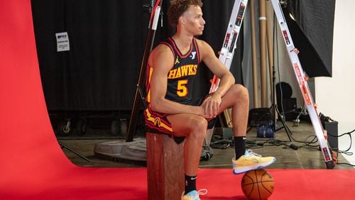 Hawks player Dyson Daniels, #5, poses for photos during media day. Hawks media day takes place on Monday, Sept 30, 2024 where media outlets including the Associated Press, Getty, NBA and many others gather to take photos, conduct interviews and gather footage.   (Jenni Girtman for The Atlanta Journal-Constitution)