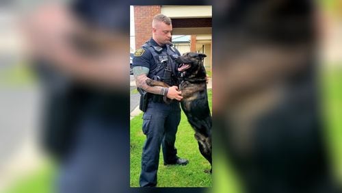 Austell Police Department K9 handler Edward Reeves stands with his new partner. The Georgia Police K9 Foundation recently donated a K9 named Bane to the Austell Police Department to replace a K9 officer that retired earlier this year after his leg was amputated from a gunshot wound. (Photo provided/Georgia Police K9 Foundation)