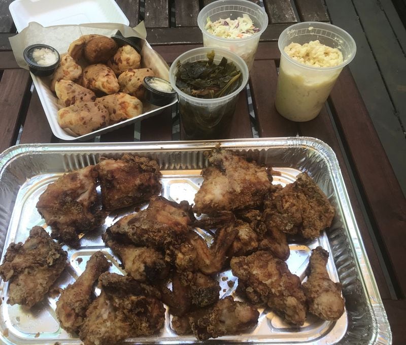 D.B.A. Barbecue offers a changing lineup of family-style meals, including the buttermilk fried chicken dinner. Priced at $45, it easily feeds a family of four. LIGAYA FIGUERAS / LIGAYA.FIGUERAS@AJC.COM