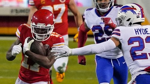 Kansas City Chiefs wide receiver Mecole Hardman (17) runs from Buffalo Bills safety Micah Hyde (23) during the first half of the AFC championship game, Sunday, Jan. 24, 2021, in Kansas City, Mo. (Jeff Roberson/AP)