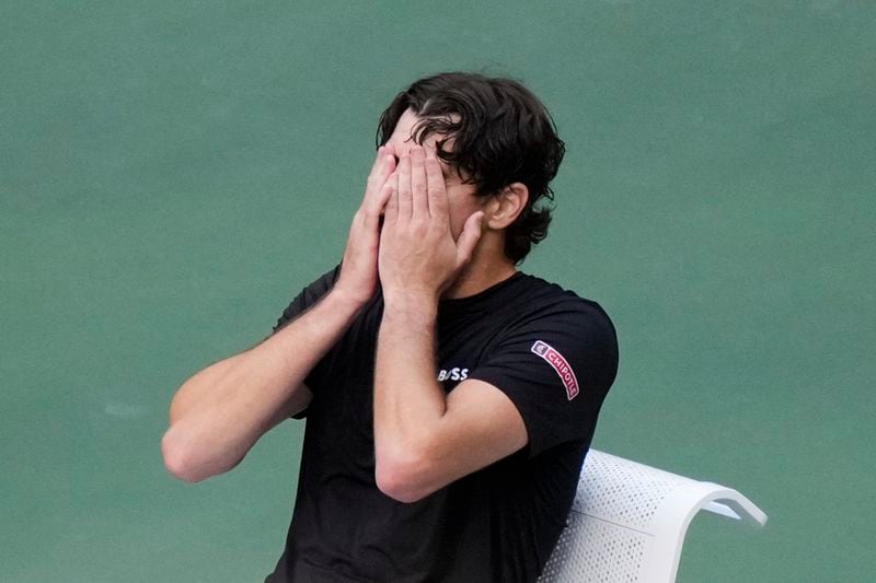 Taylor Fritz, of the United States, reacts after being defeated by Jannik Sinner, of Italy, in the men's singles final of the U.S. Open tennis championships, Sunday, Sept. 8, in New York. 2024. (AP Photo/Frank Franklin II)