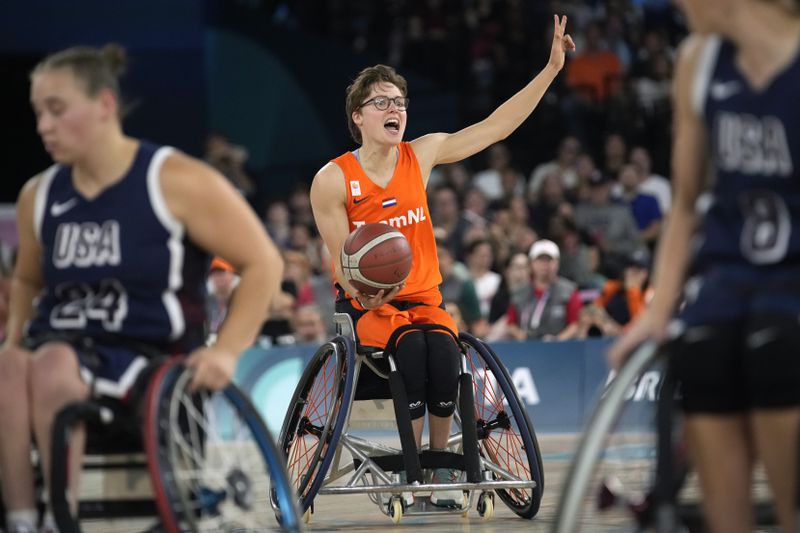 Bo Kramer of the Netherlands in action during the women's wheelchair basketball gold medal match between the Netherlands and the United States at the 2024 Paralympic Games in Paris, France, Sunday, Sept. 8, 2024. (AP Photo/Kristof Haena)