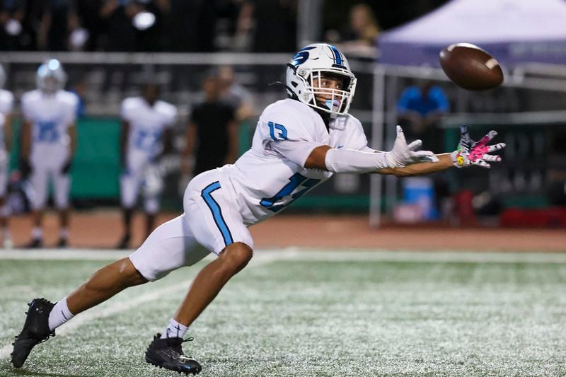 Seckinger High defensive back Tavon Carson intercepts a pass from Roswell quarterback Trey Smith during the teams' Sept. 20 game.
