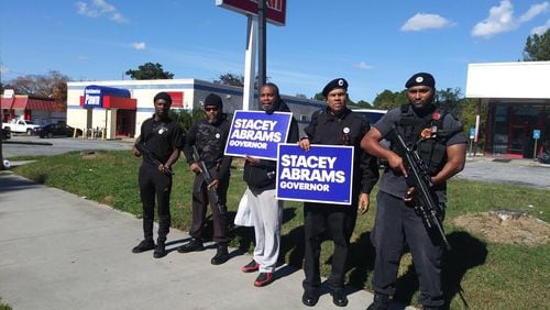 The New Black Panther Party’s Atlanta Chapter posted this picture on Nov. 3, 2018, on Facebook of members carrying weapons while campaigning for Democrat Stacey Abrams. Republican Brian Kemp shared the photos on his social media accounts the next day.