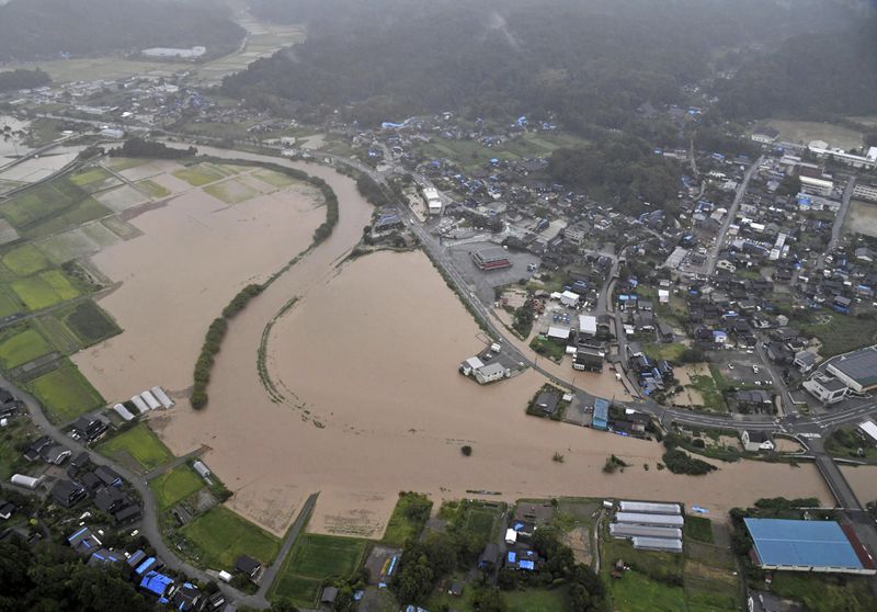 This aerial photo shows the flooded area after heavy rain in Wajima, Ishikawa prefecture, Saturday, Sept. 21, 2024. (Kyodo News via AP)