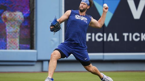 Los Angeles Dodgers' Clayton Kershaw works out before a baseball game against the Colorado Rockies in Los Angeles, Sunday, June 2, 2024. (AP Photo/Ashley Landis)
