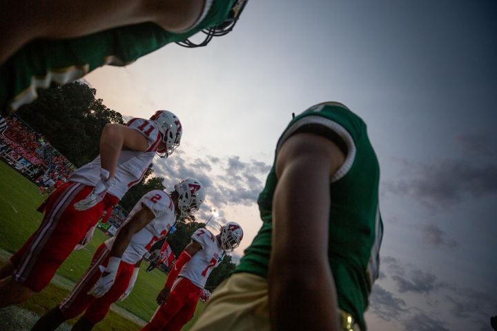 Players watch the coin toss during a GHSA high school football game between Grayson High School and Archer High School at Grayson High School in Loganville, GA., on Friday, Sept. 10, 2021. (Photo/Jenn Finch)