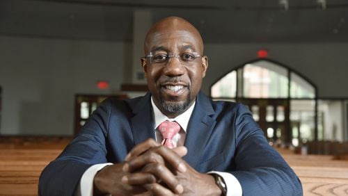 July 18, 2019 Atlanta - Portrait of Rev. Raphael Warnock at the Historic Ebenezer Baptist Church on Thursday, July 18, 2019. The Rev. Raphael G. Warnock has had busy couple of weeks. After co-hosting a conference on ending mass incarceration in the United States, he was off to Baltimore. And less than 24 hours ago, he was back at Ebenezer for the 45th annual scholarship concert honoring the memory of the late Christine Williams King, affectionately known as Mama King, who was assassinated there 45 years ago. (Hyosub Shin / Hyosub.Shin@ajc.com)