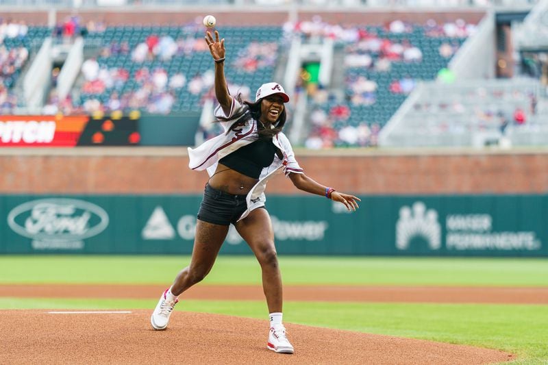 Dream player Rhyne Howard throws out the first pitch before the Braves game against the Dodgers on Wednesday, May 24.  (Photo by Matthew Grimes Jr./Atlanta Braves/Getty Images)