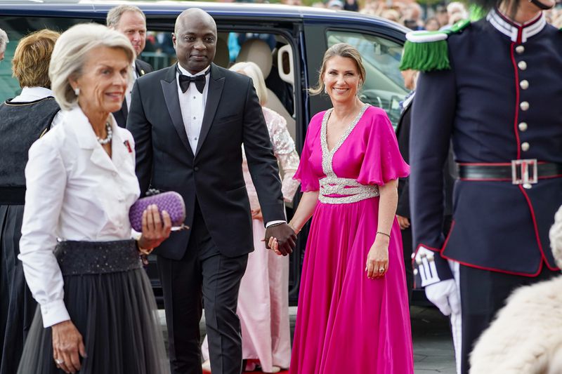 FILE - Norway's Princess Martha Louise and her fiance Durek Verrett arrive at the government's party event in connection with Princess Ingrid Alexandra's 18th birthday, which is held at Deichman Bjoervika, Oslo's main library, Thursday June 16, 2022. (Hakon Mosvold Larsen/NTB via AP, File)