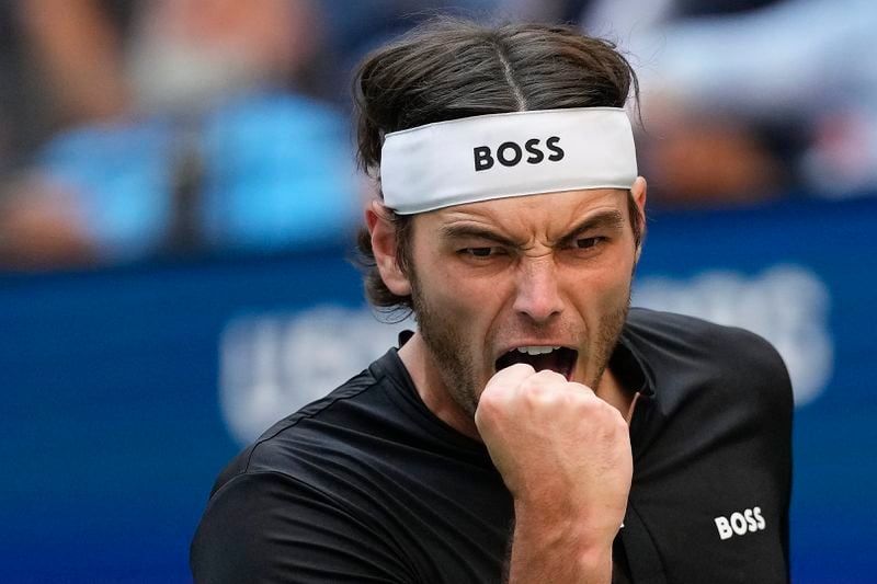 Taylor Fritz, of the United States, reacts after scoring a point against Alexander Zverev, of Germany, during the quarterfinals of the U.S. Open tennis championships, Tuesday, Sept. 3, 2024, in New York. (AP Photo/Kirsty Wigglesworth)