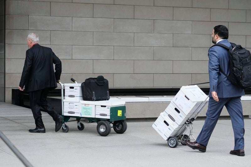 Documents to support Dallas Cowboys owner Jerry Jones' testimony are wheeled into federal court Tuesday, June 18, 2024, in Los Angeles. Jones is testifying in a class-action lawsuit filed by "Sunday Ticket" subscribers claiming the NFL broke antitrust laws. (AP Photo/Damian Dovarganes)