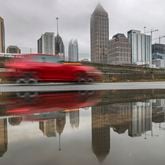 If you have to drive in heavy rain, slow down and allow yourself extra time, Atlanta police agencies suggest. Hazard lights aren't necessary unless in an emergency.