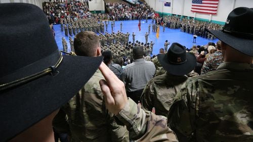 The U.S. military held a departure ceremony Friday at Fort Stewart for the Georgia National Guard’s 48th Brigade, which is headed to Afghanistan for a nine-month deployment. Curtis Compton/ccompton@ajc.com