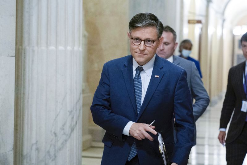 Speaker of the House Mike Johnson, R-La., walks to a meeting at the Capitol in Washington, Wednesday, Sept. 11, 2024. (AP Photo/Jose Luis Magana)