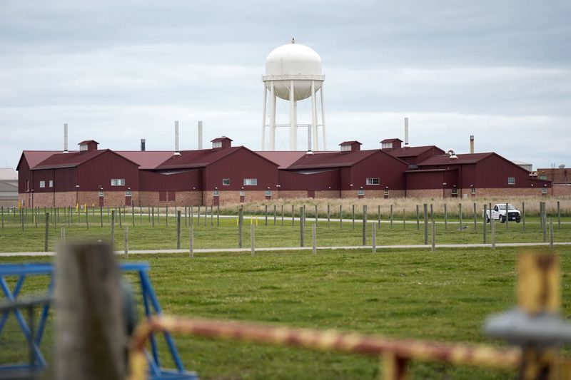 A large animal containment building is seen on the campus of the U.S. Department of Agriculture's National Animal Disease Center research facility in Ames, Iowa, on Tuesday, Aug. 6, 2024. (AP Photo/Charlie Neibergall)