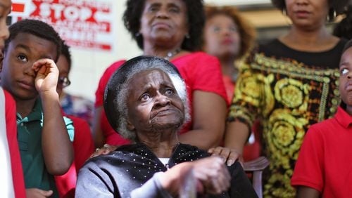 Mattie Jackson at a 2015 rally related to their fight over the city's plans to raze several homes in the Peoplestown area. BOB ANDRES / BANDRES@AJC.COM