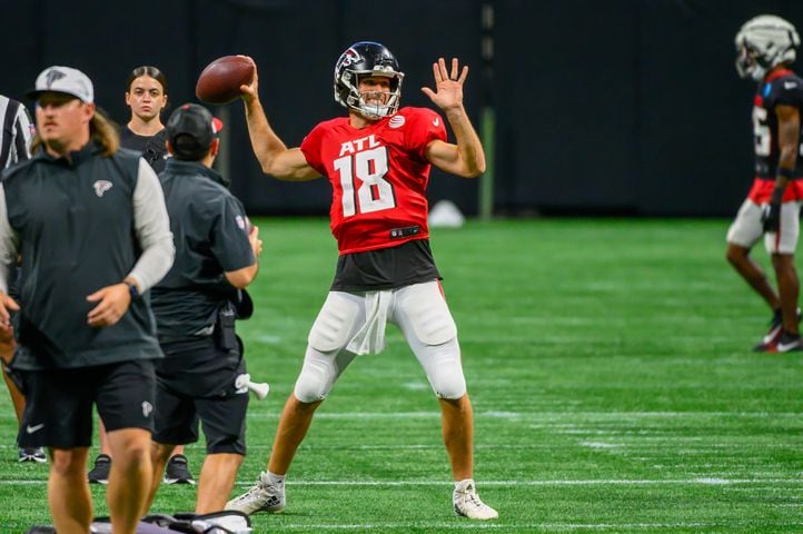 Falcons quarterback Kirk Cousins throws a pass during practice at Mercedes-Benz Stadium on August 2, 2024. (Jamie Spaar for the Atlanta Journal Constitution)