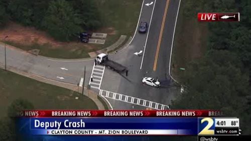 A Clayton County deputy was injured Thursday in a head-on crash near Jackson Elementary School. (Credit: Channel 2 Action News)