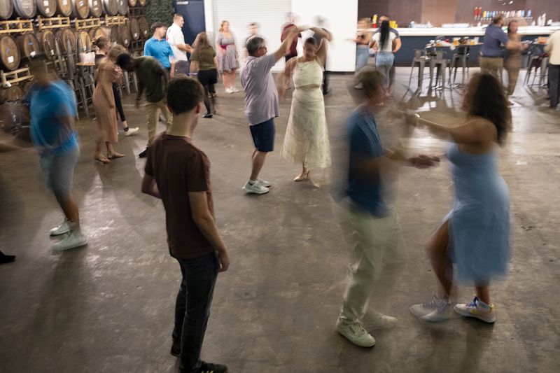 The classes at Wild Heaven West End are equal parts social mixer and dance lesson. Ben Gray/ben@bengray.com