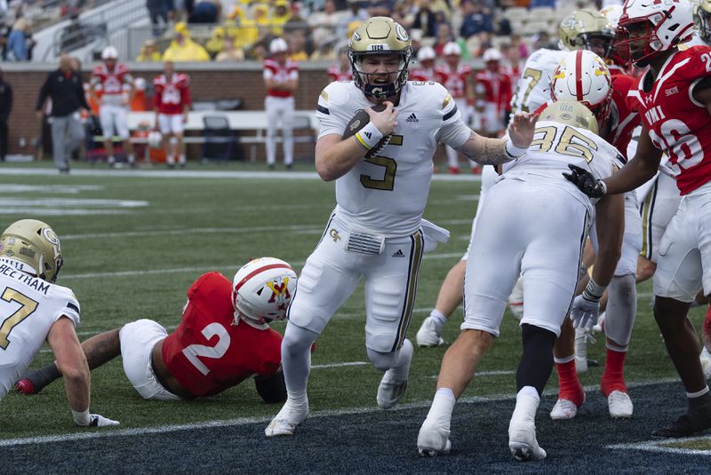 Georgia Tech quarterback Zach Pyron (5) runs for a touchdown during the first half of a NCAA college football game against Virginia Military Institute Saturday, Sept. 14, 2024, in Atlanta,. (AP Photo/John Bazemore)