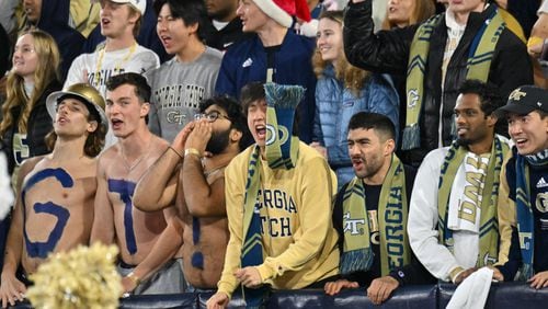 Georgia Tech fans cheer before the start of the Georgia Tech home game against Georgia during an NCAA college football game at Georgia Tech's Bobby Dodd Stadium, Saturday, November 25, 2023, in Atlanta. Georgia won 31-23 over Georgia Tech. (Hyosub Shin / Hyosub.Shin@ajc.com)