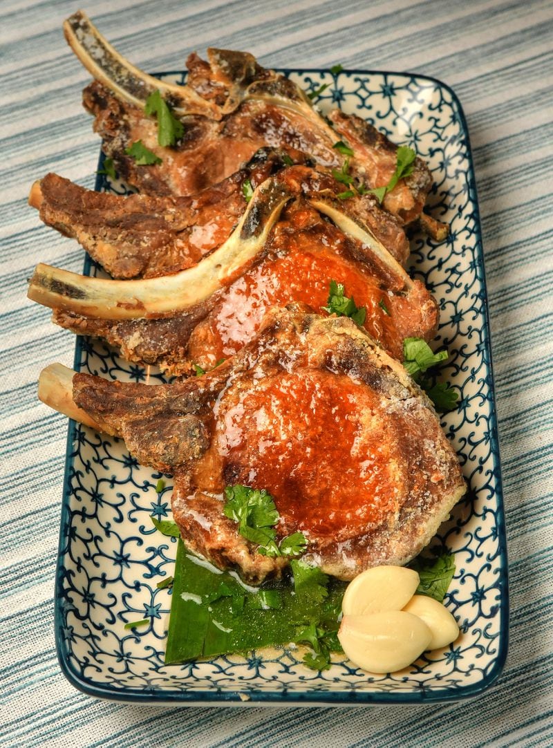 Fried Adobo Pork Chops is based on a dish made by the Filipino mother of Mike Pimentel, founder of Filipino pop-up Adobo ATL, while he was growing up in New York. Styling by Mike Pimentel / Chris Hunt for The Atlanta Journal-Constitution