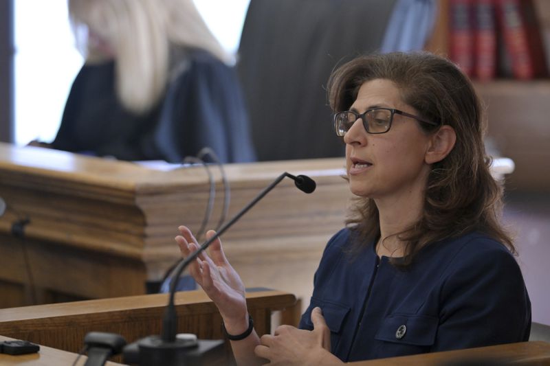 Dr. Irini Scordi-Bello, a medical examiner for the state's medical examiner's office testifies during Karen Read's trial in Norfolk Superior Court, Friday, June 21, 2024, in Dedham, Mass. Read, 44, is accused of running into her Boston police officer boyfriend with her SUV in the middle of a nor'easter and leaving him for dead after a night of heavy drinking. (AP Photo/Josh Reynolds, Pool)