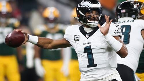 Philadelphia Eagles quarterback Jalen Hurts (1) passes against the Green Bay Packers during the first half of an NFL football game, Friday, Sept. 6, 2024, at the Neo Quimica Arena in Sao Paulo. (AP Photo/Gregory Payan)