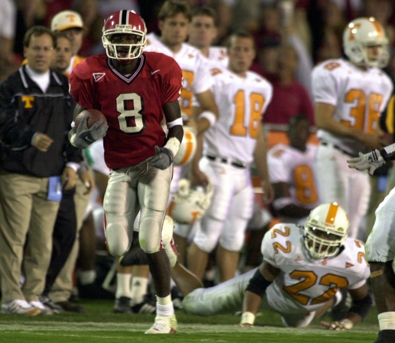 Georgia's Terrence Edwards runs after a catch against Tennessee at Sanford Stadium on Oct. 7, 2000.  (T. Levette Bagwell/AJC file photo)