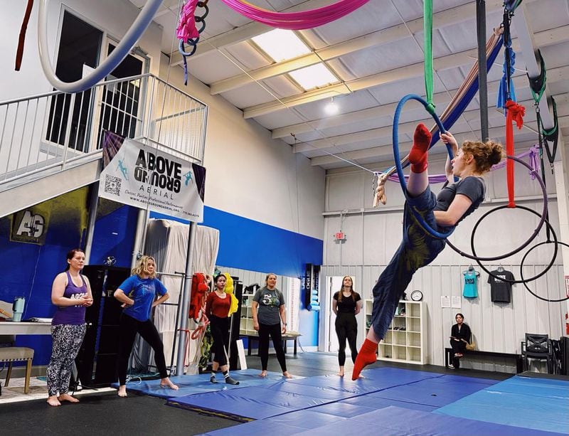 Aerial Arts classes, such as this one at Above Ground Aerial Arts, let you work out using rings, silks and other apparatuses.
(Courtesy of Above Ground Aerial Arts)