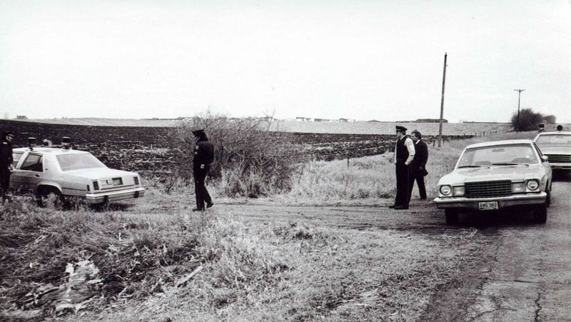 Investigators are shown at the ditch where a newborn boy, his umbilical cord and placenta still attached to his body, was found frozen to death Feb. 28, 1981, in Sioux Falls, South Dakota. After more than 38 years, cold case detectives on Friday, March 8, 2019, arrested the baby's mother, Theresa Josten Bentaas, now 57, and charged her with murder in his death. Bentaas, who was 19 when she gave birth, was identified through genealogy databases and DNA taken from the baby's exhumed body a decade ago.