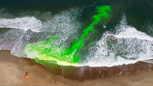 This image provided by NOAA, pictures a harmless green dye used to show a rip current. Rip currents are powerful, narrow channels of fast-moving water that are prevalent along the East, Gulf, and West coasts of the U.S., as well as along the shores of the Great Lakes. About 100 people drown from rip currents along U.S. beaches each year, according to the U.S. Lifesaving Association. (NOAA via AP)
