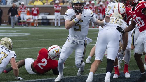 Georgia Tech quarterback Zach Pyron (5) runs for a touchdown during the first half of a NCAA college football game against Virginia Military Institute Saturday, Sept. 14, 2024, in Atlanta,. (AP Photo/John Bazemore)