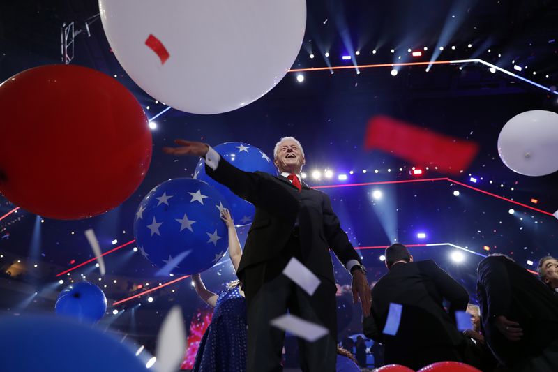 FILE - Former President Bill Clinton smiles as balloons fall during the final day of the Democratic National Convention, July 28, 2016, in Philadelphia. (AP Photo/Carolyn Kaster, file)