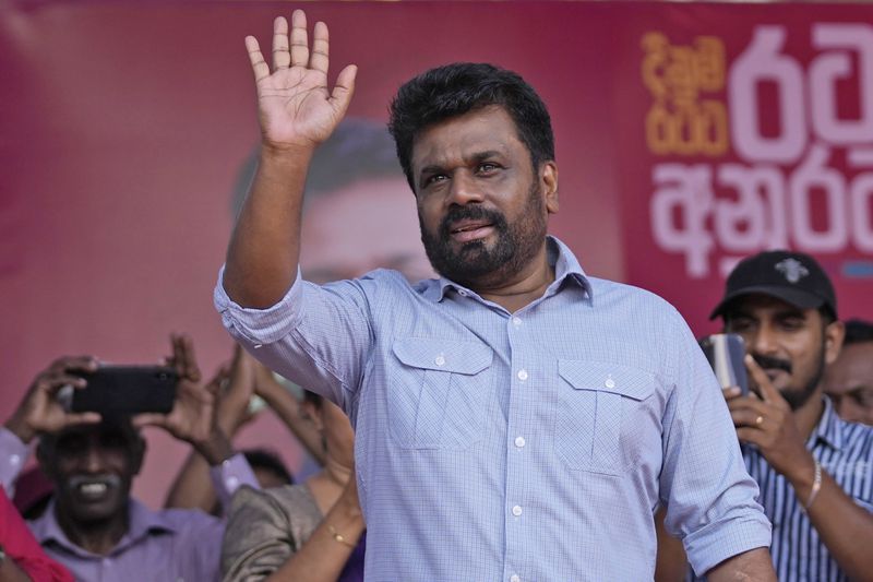 FILE -Leader and the presidential candidate of National People's Power Anura Kumara Dissanayake waves to supporters during a public rally in Dehiowita, Sri Lanka, Sept. 17, 2024. (AP Photo/Eranga Jayawardena, File)