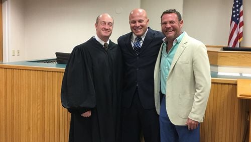 Peter Del Toro, center, with Martin County Judge Darren Steele (left) and Dr. Timothy Sigman, Del Toro’s former co-defendant, after the judge swears Del Toro into the Florida Bar on Monday, April 17, 2017.