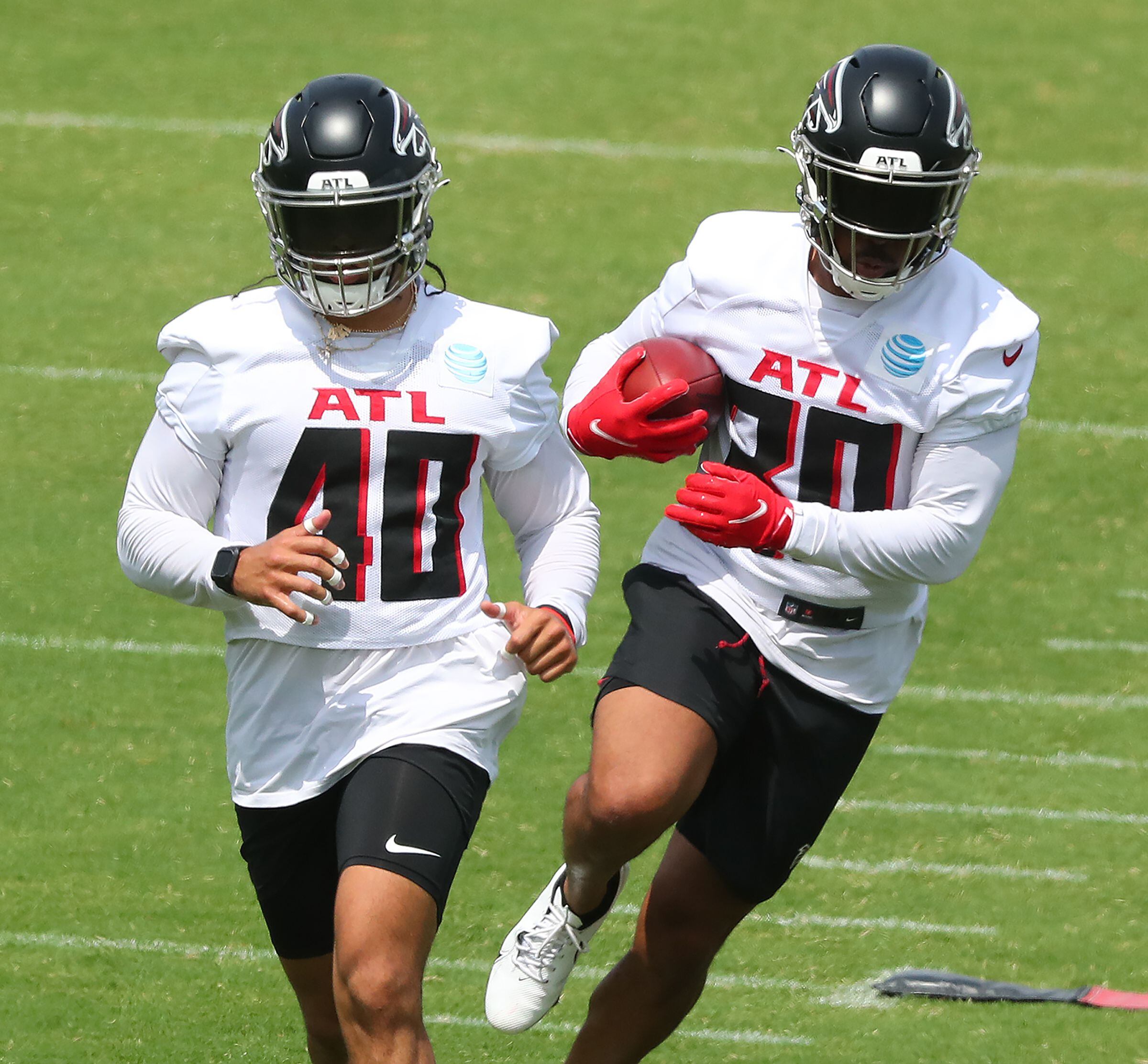 Atlanta Falcons running back Qadree Ollison (30) walks to the