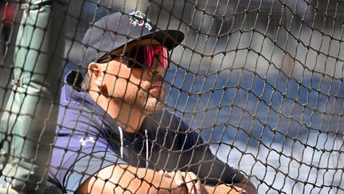 Gwinnett Stripers manager Matt Tuiasosopo watches batting practice during a workout at Coolray Field, Wednesday, March 29, 2023, in Lawrenceville. (Hyosub Shin / Hyosub.Shin@ajc.com)