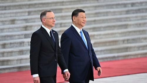 Chinese President Xi Jinping, right and Poland's President Andrzej Duda attend the welcome ceremony at the Great Hall of the People in Beijing, Monday, June 24, 2024. (Pedro Pardo/Pool Photo via AP)