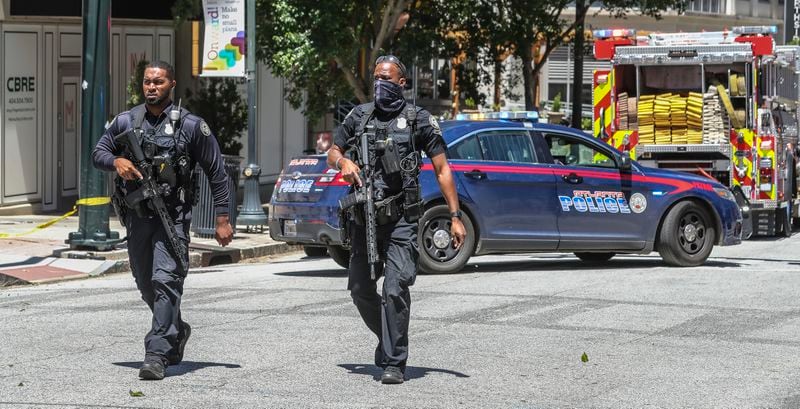 Atlanta police and a multi-jurisdiction police force swarmed Midtown Atlanta on Wednesday, May 3, 2023 after 5 people were shot.  (John Spink / John.Spink@ajc.com)

